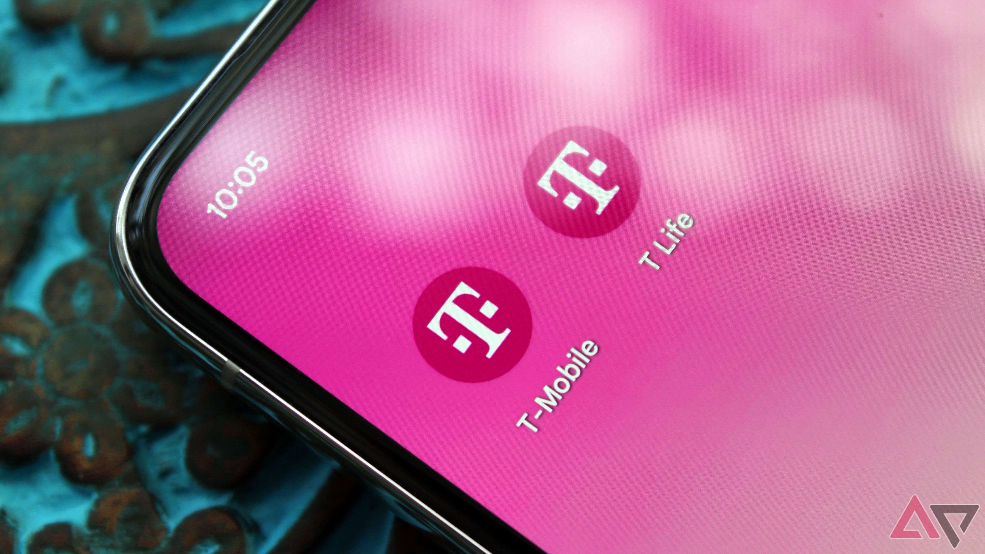 Photo of a phone with the T-Mobile app and T Life app on its home screen.