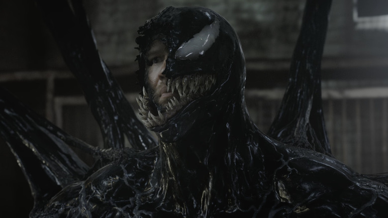 Tom Hardy's Eddie Brock peeks out from his Venom form in Venom The Last Dance