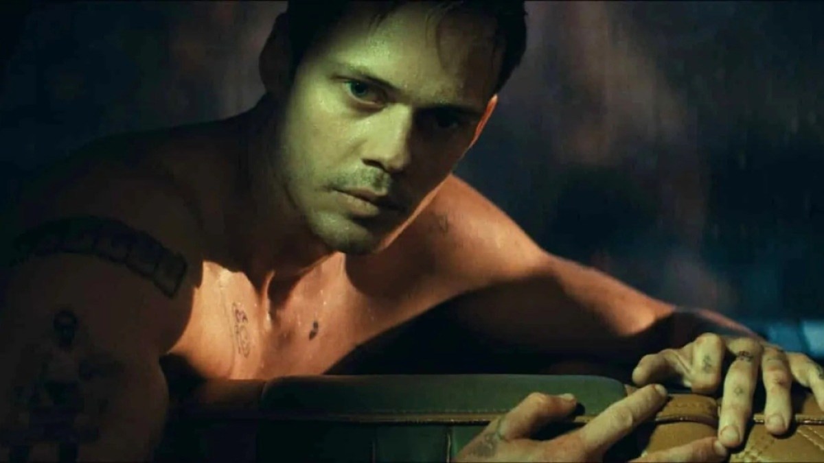 Bill Skarsgard as Eddie sweating in Locked