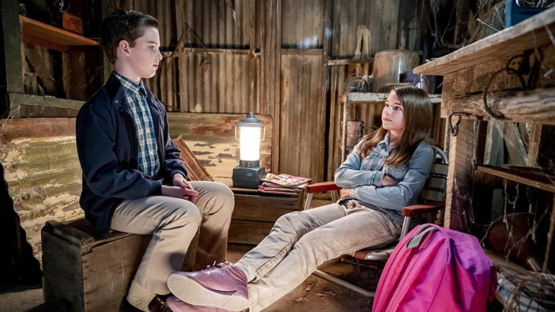 Young Sheldon, Sheldon and Missy talking in a cabin