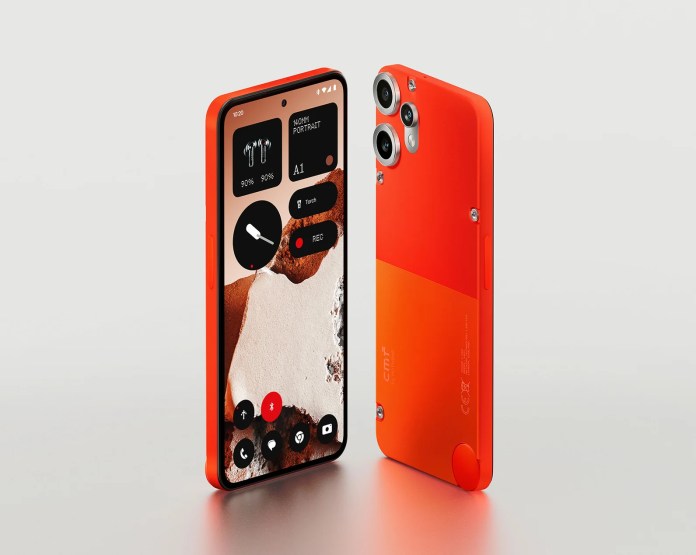A close-up of the CMF Phone 2 Pro in a vibrant orange finish, showcasing its sleek design, modular back panel, and user interface on the display.