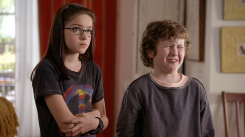 Ariel Winter as Alex Dunphy and Nolan Gould as Luke Dunphy on Modern Family