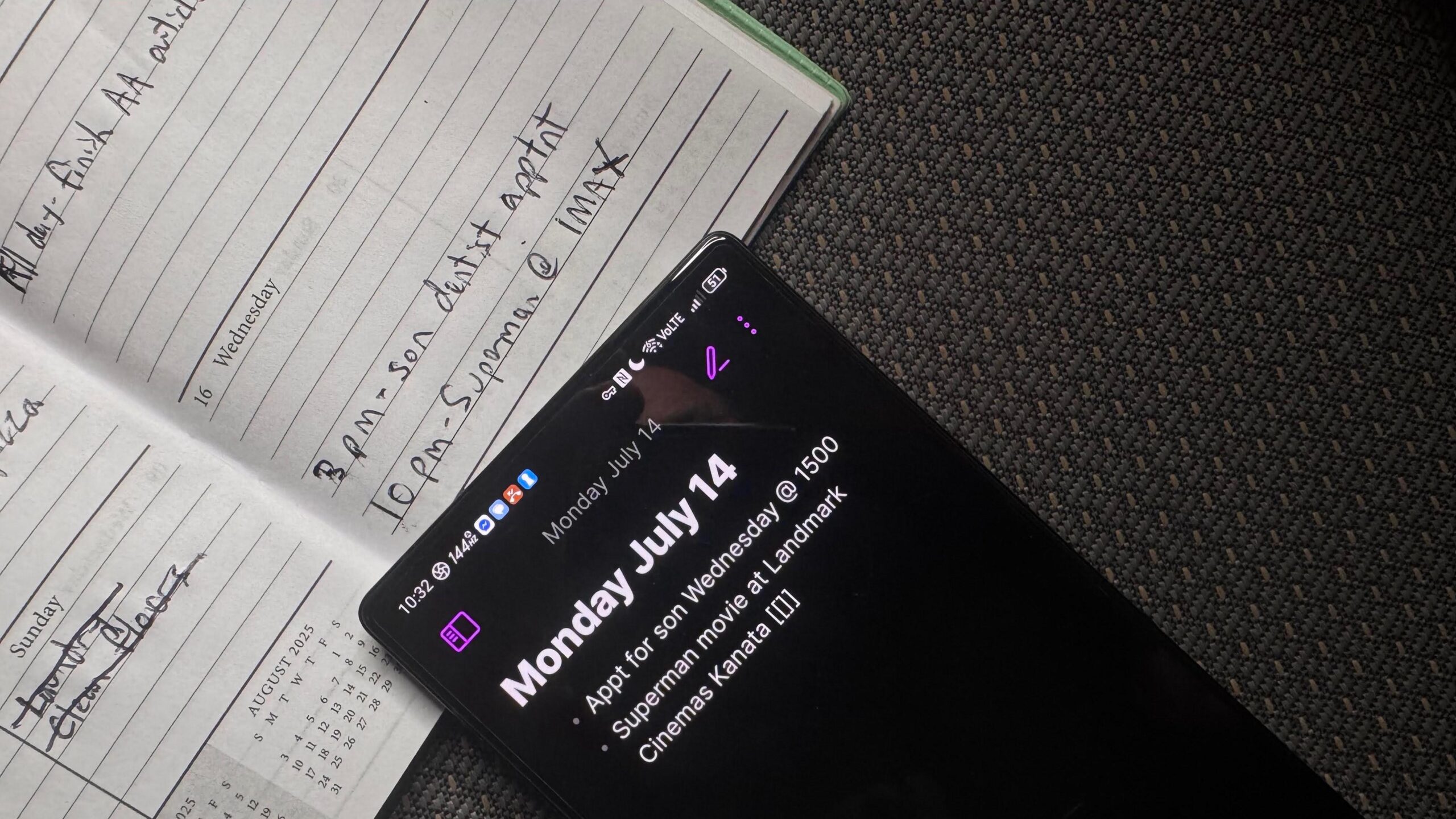 obsidian paper planner The Obsidian app open on a black Android with a white paper planner underneath.