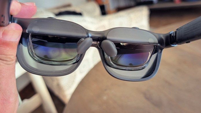 Close-up view of VITURE Luma Pro XR glasses, highlighting their design features such as translucent matte plastic frame and adjustable nose pads.