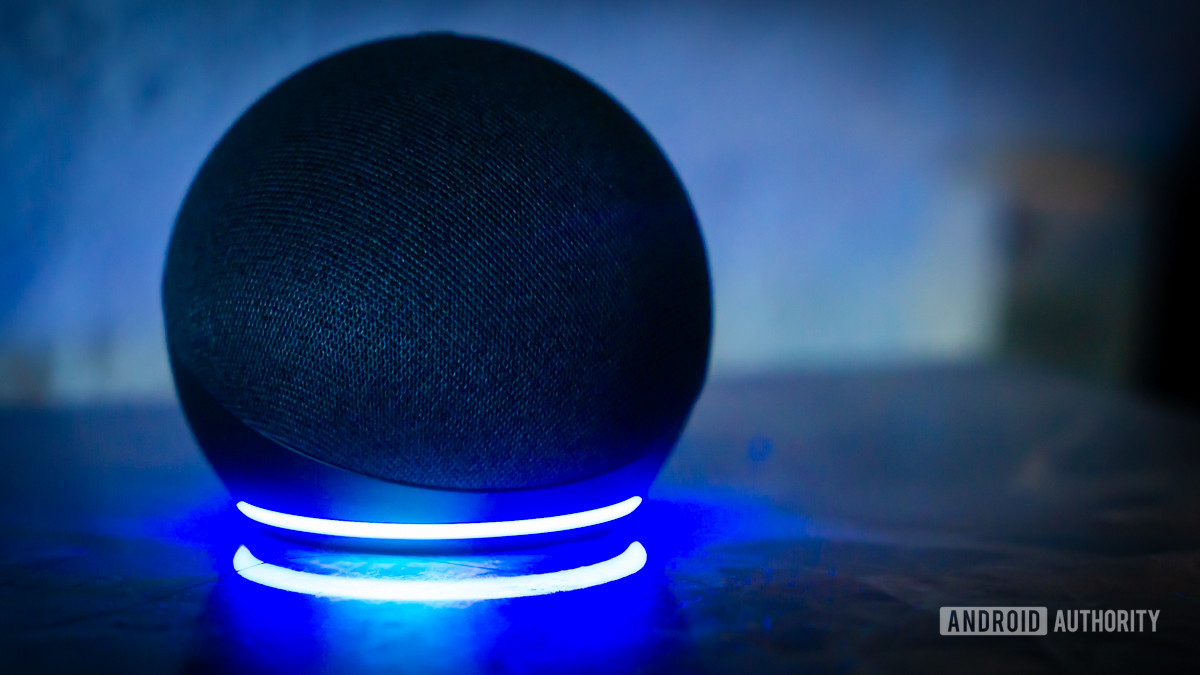 Amazon Echo Dot Alexa speaker with light ring turned on stock photo 1 Amazon Echo Dot Alexa speaker with light ring turned on stock photo 1