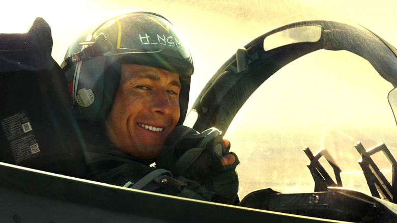 Hangman smiling in his cockpit in Top Gun: Maverick