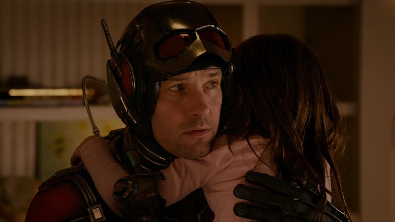 Paul Rudd as Scott Lang hugs Abby Ryder Fortson as Cassie Lang in Ant-Man