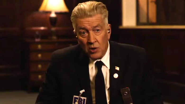 Gordon Cole sitting down in 